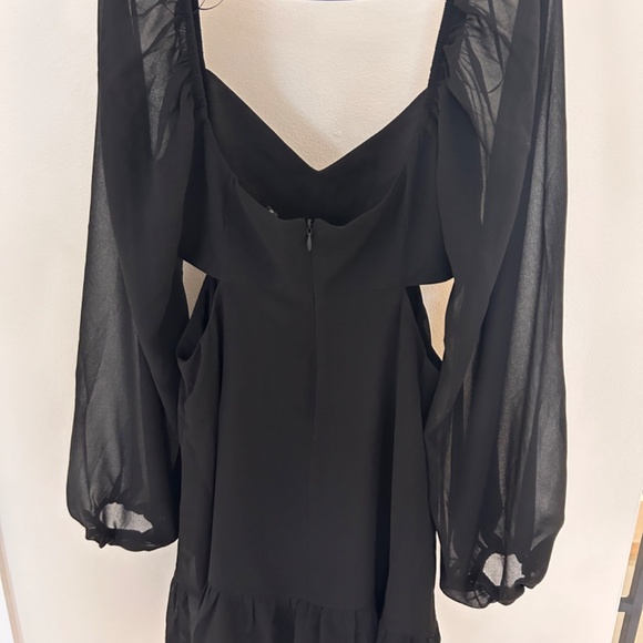 Black dress with cut outs - Picture 2 of 3